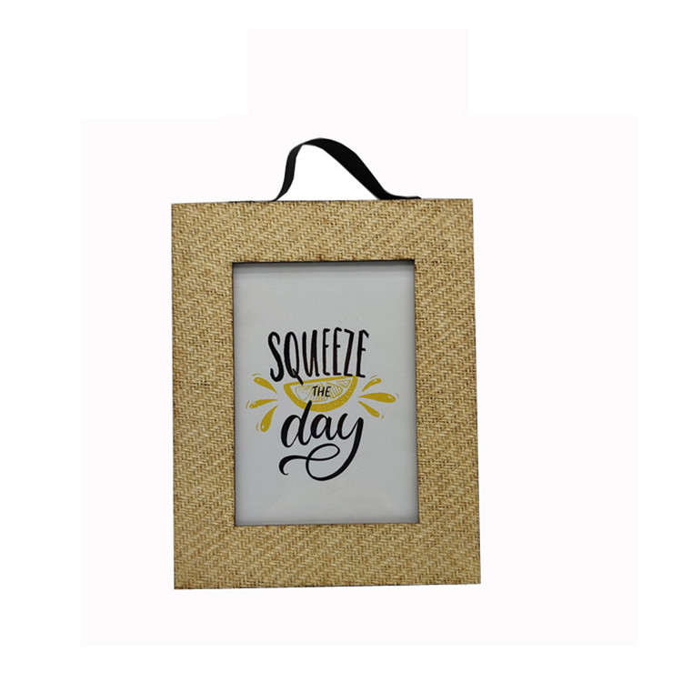 PHOTA Hanging 5x7 inch wooden picture frame features a natural woven wood finish