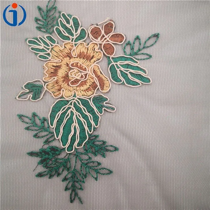 China Custom Floral Cord Embroidered Fabric Manufacturers
