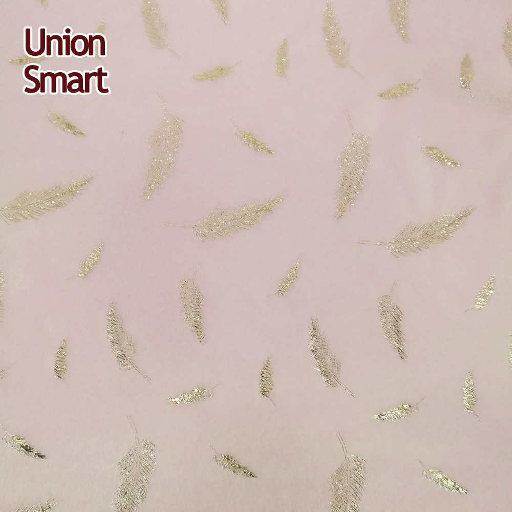 Flannel fleece polyester fabric with metallic foil printed